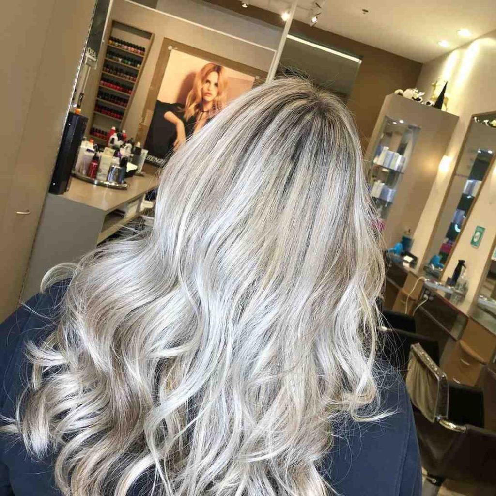 Platinum Blonde Waves With Root Shadow